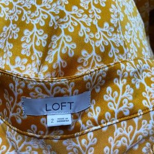 Silky smooth Loft skirt. Midi length. Size 2. Perfect condition, never worn.